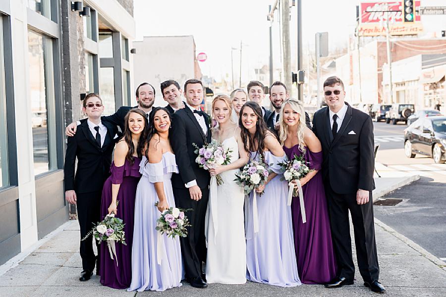 bridal party posing together