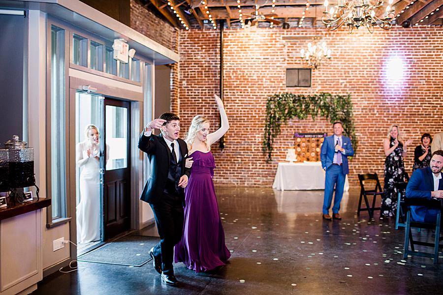bridal party entering reception