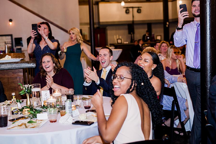 reception guests clapping