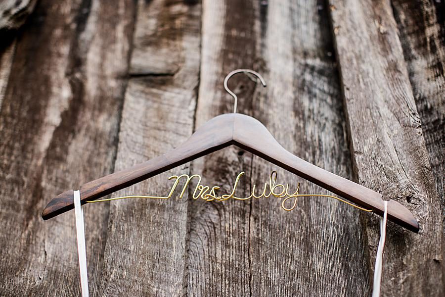 Personalized hanger at this RiverView Family Farm wedding by Knoxville Wedding Photographer, Amanda May Photos.