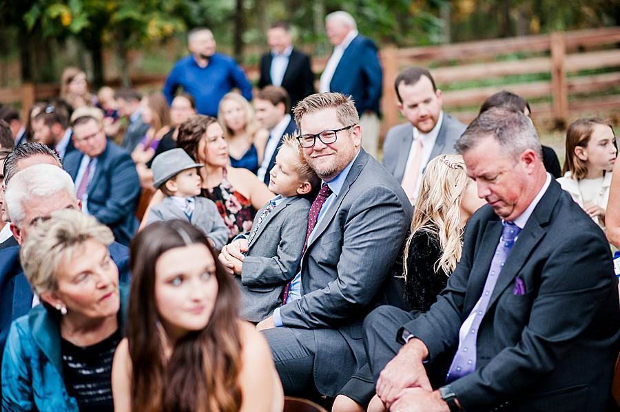 Wedding guest at this RiverView Family Farm wedding by Knoxville Wedding Photographer, Amanda May Photos.