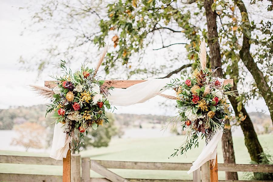 Wedding arch at this RiverView Family Farm wedding by Knoxville Wedding Photographer, Amanda May Photos.