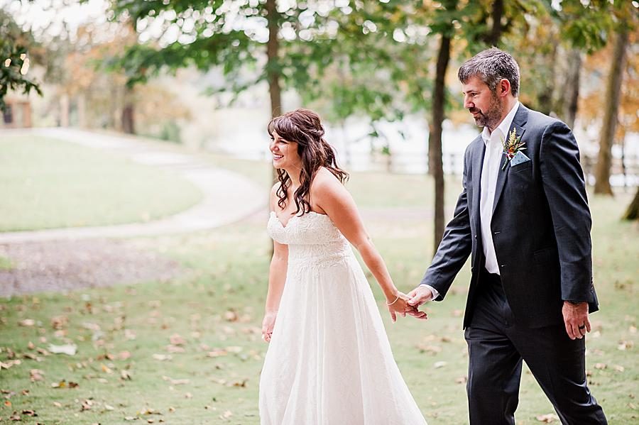 Walking at this RiverView Family Farm wedding by Knoxville Wedding Photographer, Amanda May Photos.