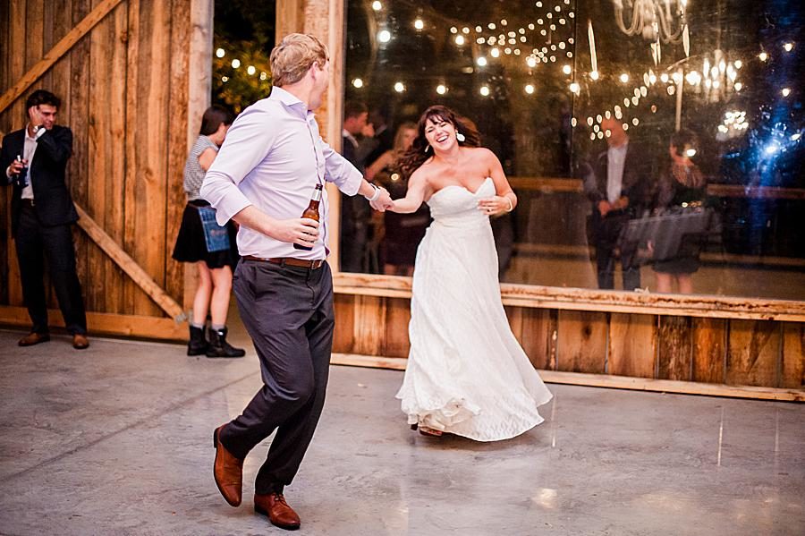 Guests dancing by Knoxville Wedding Photographer, Amanda May Photos.