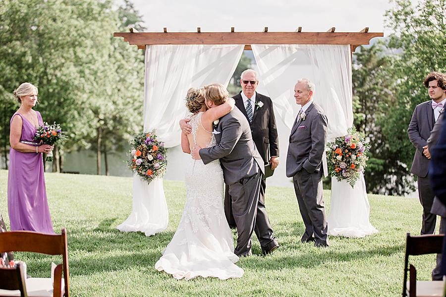 Giving mom away at this intimate WindRiver wedding by Knoxville Wedding Photographer Amanda May Photos.