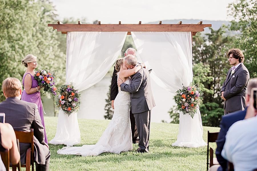 You may kiss the bride at this intimate WindRiver wedding by Knoxville Wedding Photographer Amanda May Photos.
