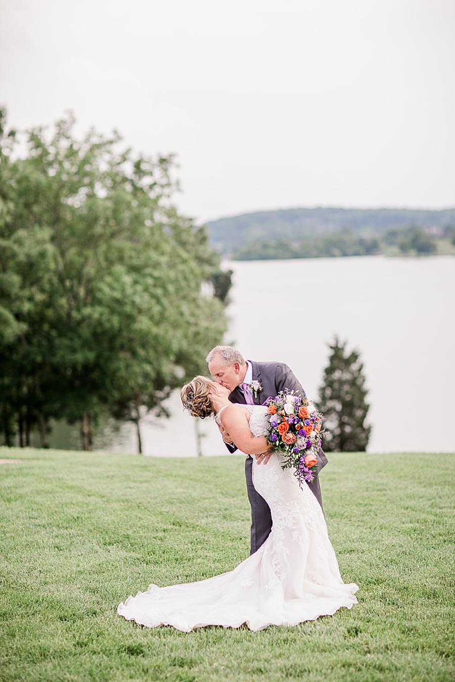 Dip kiss at this intimate WindRiver wedding by Knoxville Wedding Photographer Amanda May Photos.