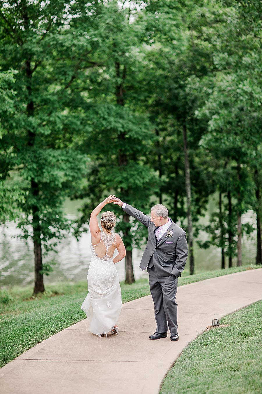 Twirling at this intimate WindRiver wedding by Knoxville Wedding Photographer Amanda May Photos.