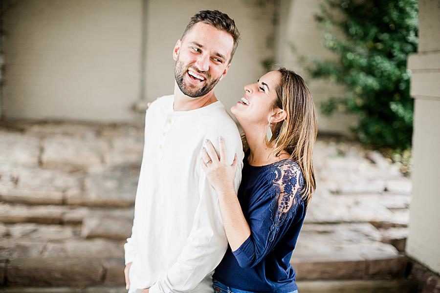 Laughing at this Southern Railway Station Engagement by Knoxville Wedding Photographer, Amanda May Photos.