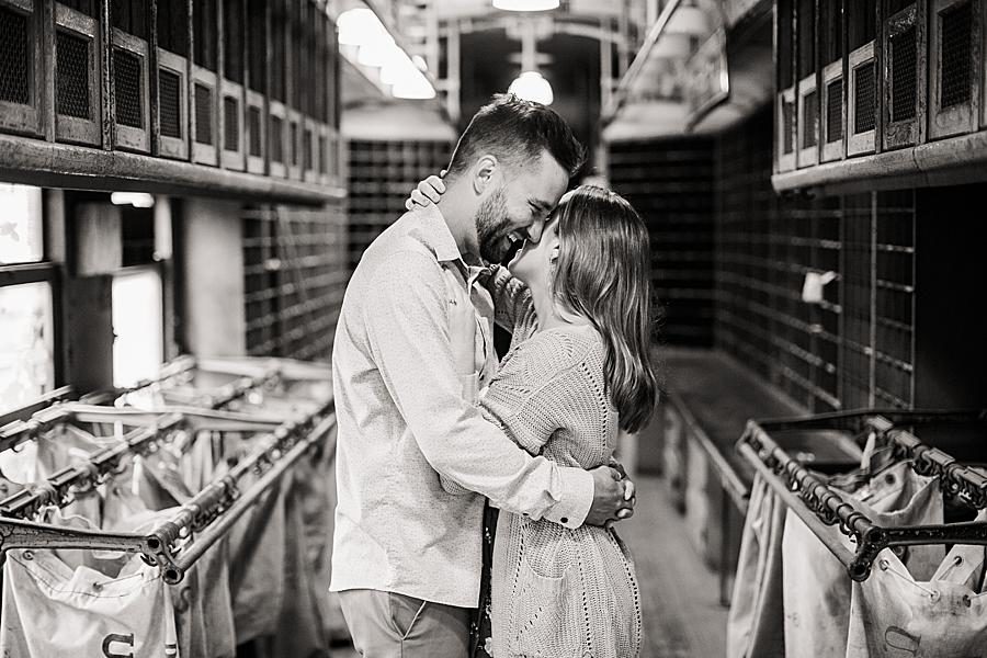 Nuzzling at this Southern Railway Station Engagement by Knoxville Wedding Photographer, Amanda May Photos.