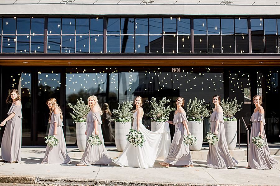 Walking outside at this The Press Room Wedding by Knoxville Wedding Photographer, Amanda May Photos.