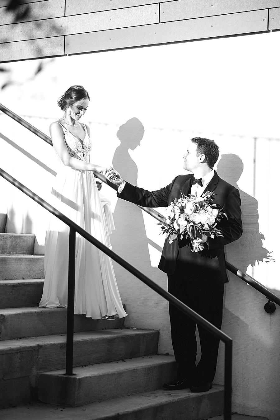 Down the stairs at this The Press Room Wedding by Knoxville Wedding Photographer, Amanda May Photos.
