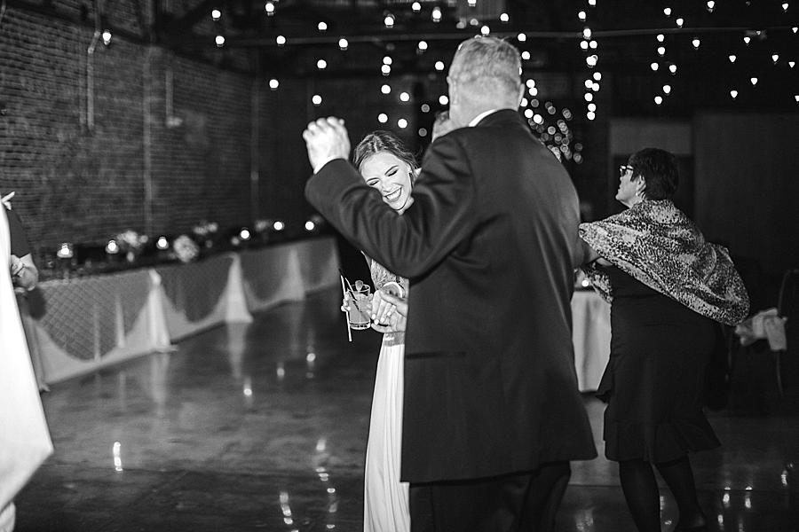 Guests dancing by Knoxville Wedding Photographer, Amanda May Photos.