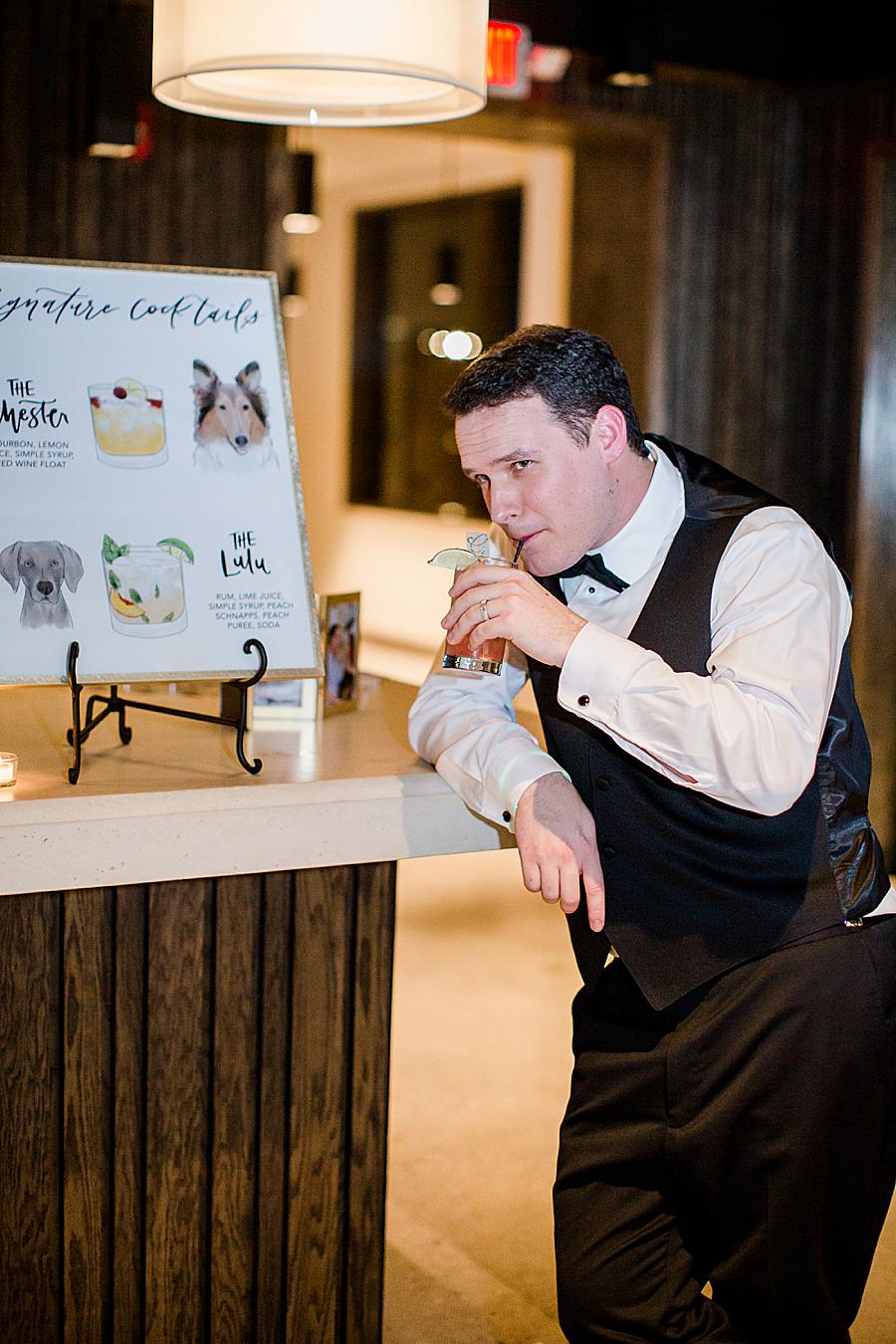Groom drinking by Knoxville Wedding Photographer, Amanda May Photos.
