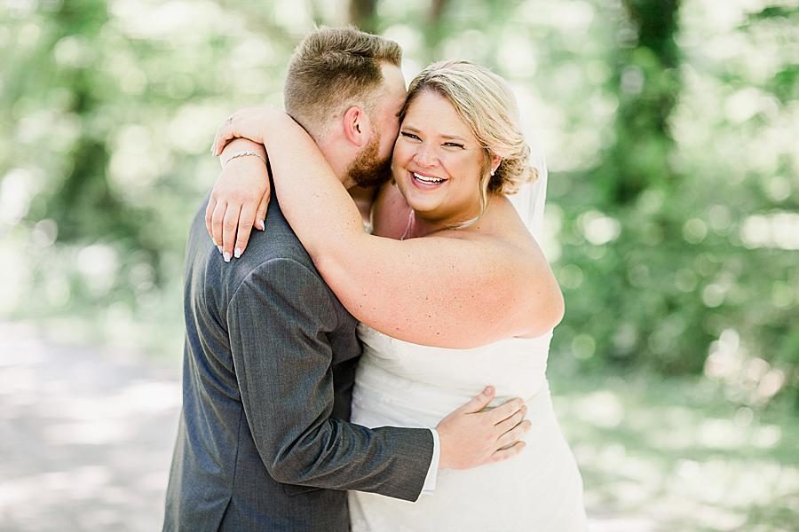 Bride and groom at this Strawberry Creek Wedding by Knoxville Wedding Photographer, Amanda May Photos.