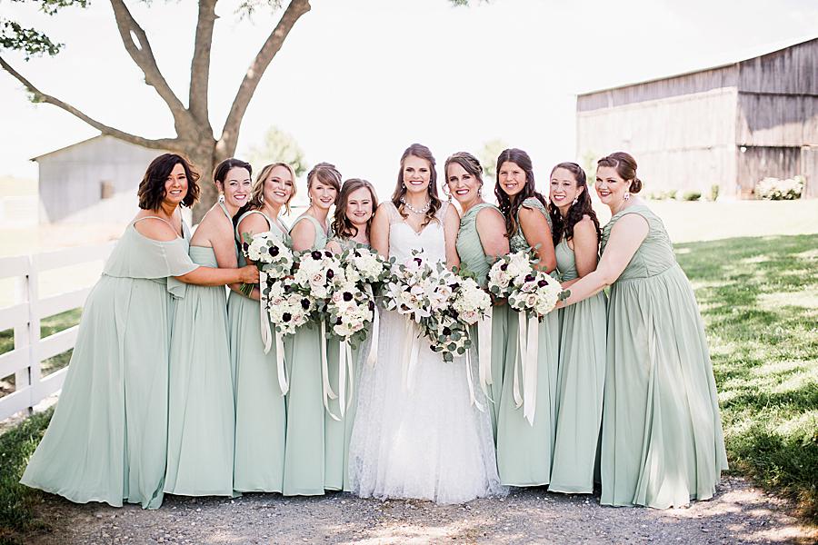 bridesmaids in mint green dresses at the white rose