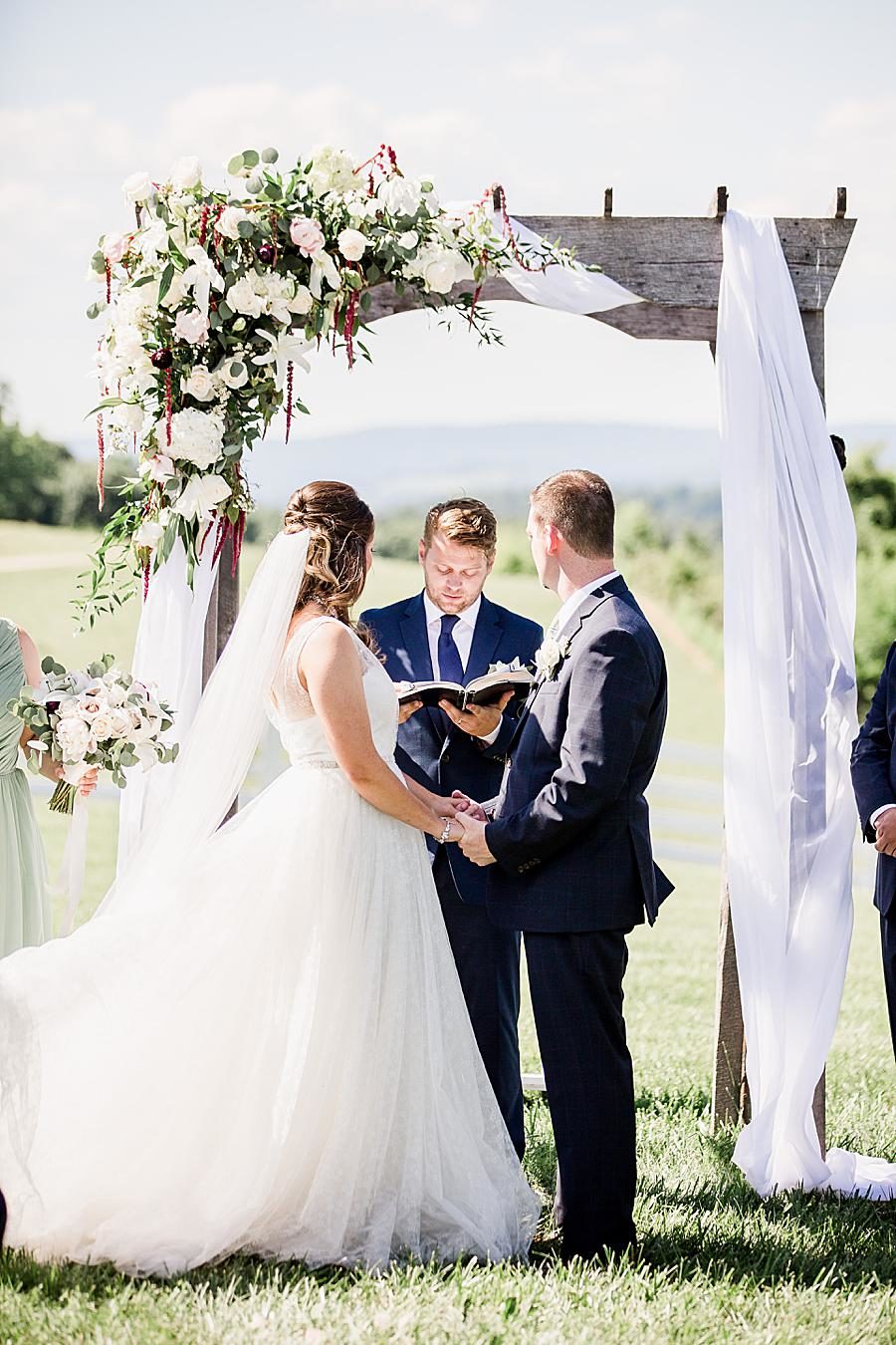exchanging vows at the white rose