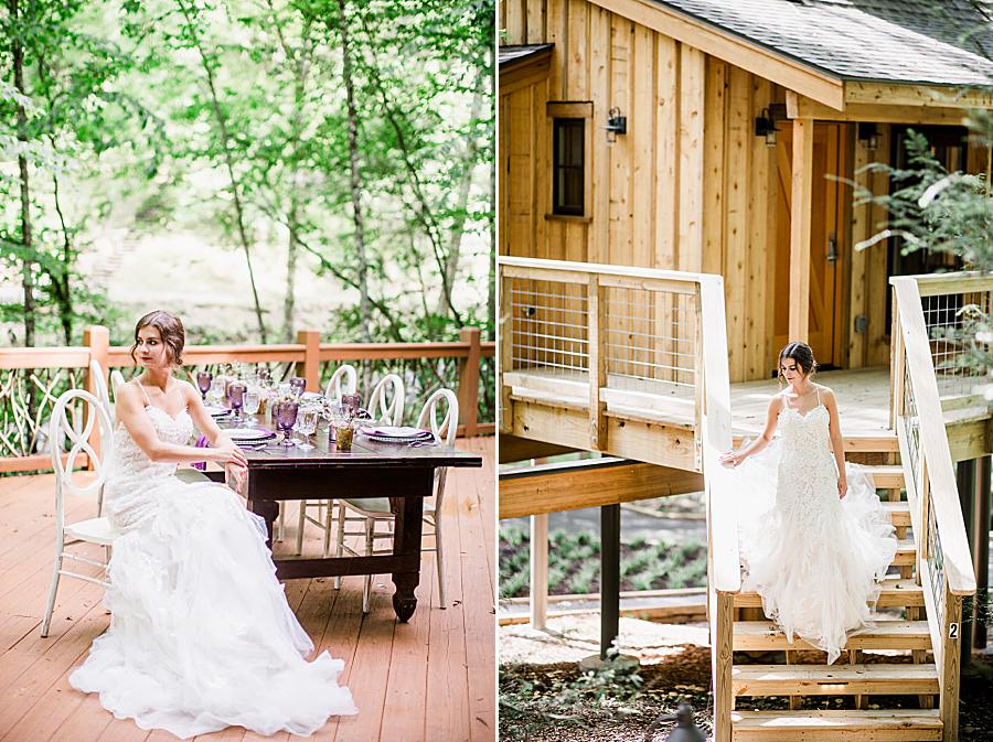 bride sitting at reception table at treehouse grove styled shoot