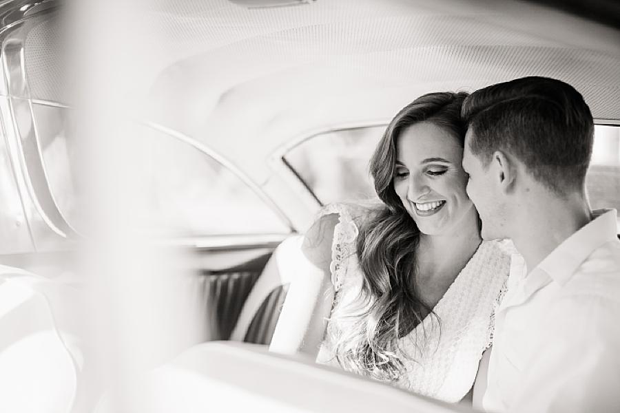 Black and white photo at Vintage car engagement