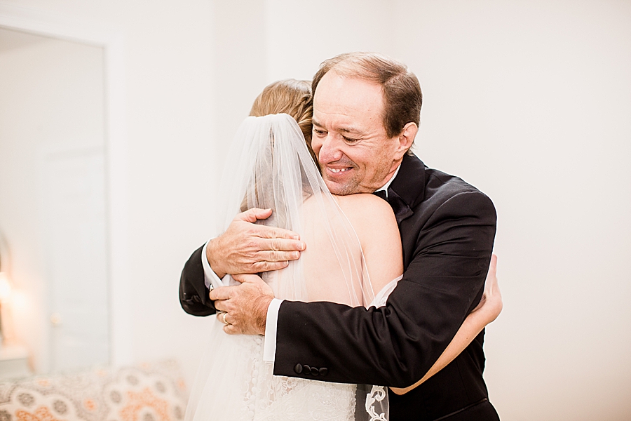 dad hugging bride at whitestone