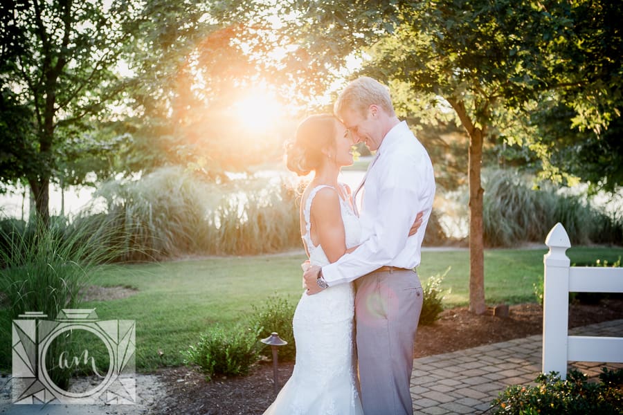 Foreheads touching with sunset behind at this favorite wedding photo by Knoxville Wedding Photographer, Amanda May Photos.