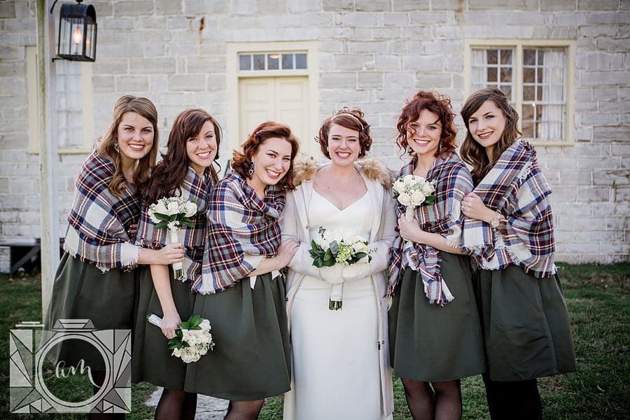 Bride with bridesmaids in winter at this favorite wedding photo by Knoxville Wedding Photographer, Amanda May Photos.