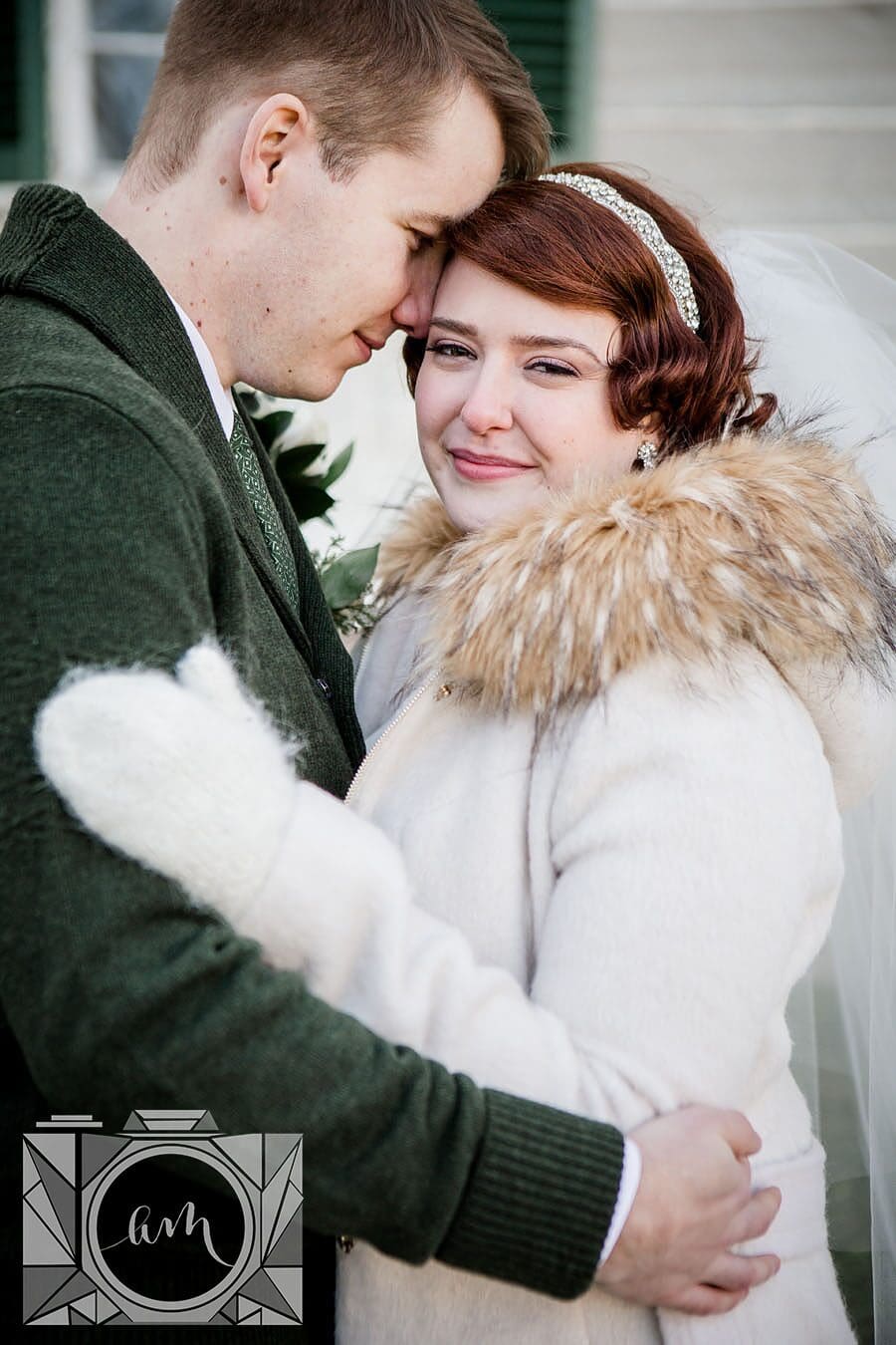 Bride and groom hugging at this favorite wedding photo by Knoxville Wedding Photographer, Amanda May Photos.