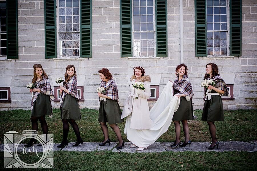 Walking in cold at this favorite wedding photo by Knoxville Wedding Photographer, Amanda May Photos.