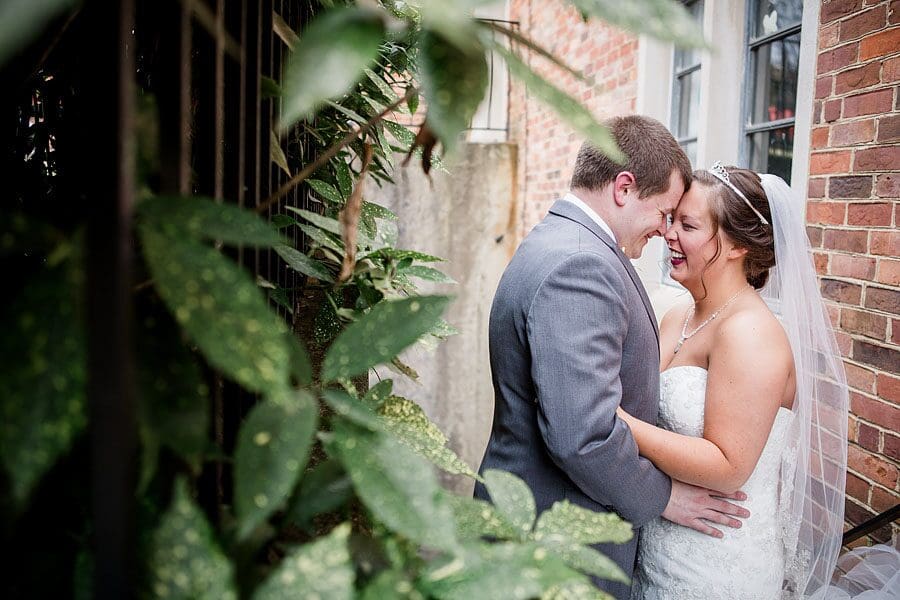 Laughing at each other at this favorite wedding photo by Knoxville Wedding Photographer, Amanda May Photos.