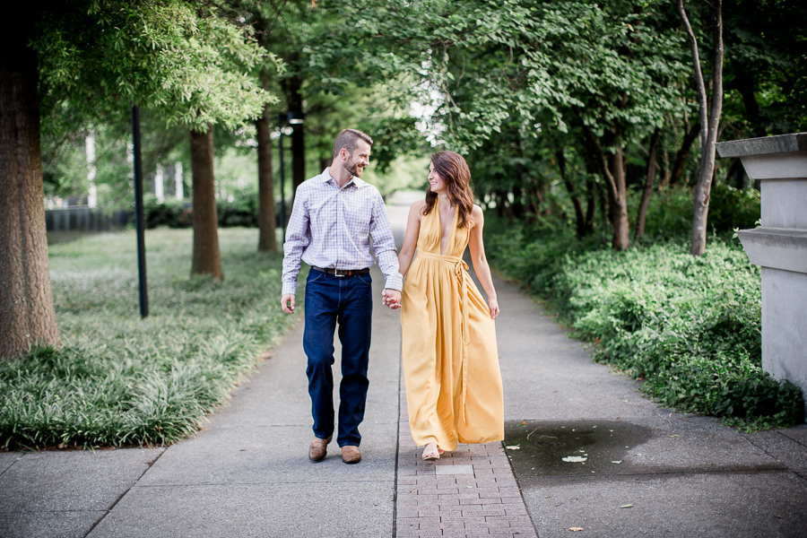 Walking in a yellow dress at this Bicentennial Mall Park Family session by Nashville Wedding Photographer, Amanda May Photos.