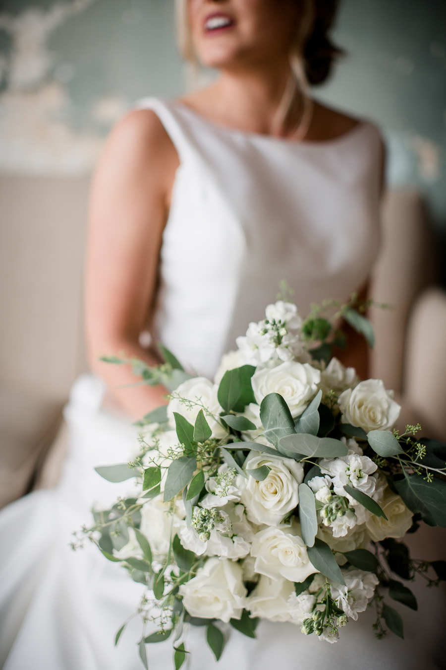 Bouquet resting on her lap at these 2017 favorite weddings by Knoxville Wedding Photographer, Amanda May Photos.