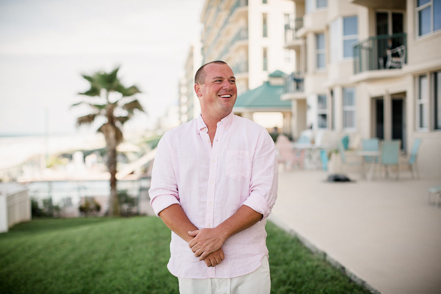 Groom laughing in pink shirt at these 2017 favorite weddings by Knoxville Wedding Photographer, Amanda May Photos.