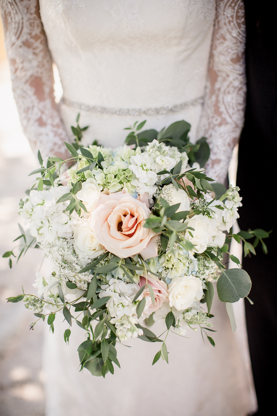 Bride holding her bouquet at these 2017 favorite weddings by Knoxville Wedding Photographer, Amanda May Photos.