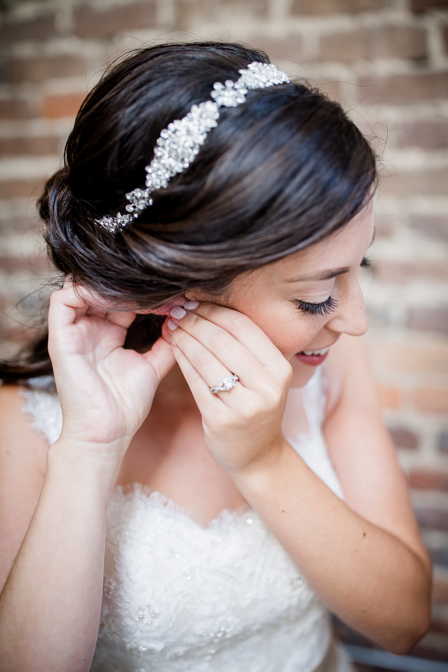 Putting her earring on at these 2017 favorite weddings by Knoxville Wedding Photographer, Amanda May Photos.