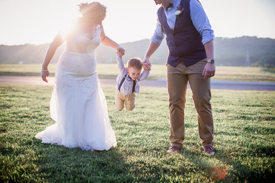 Swinging the ring bearer at these 2017 favorite weddings by Knoxville Wedding Photographer, Amanda May Photos.