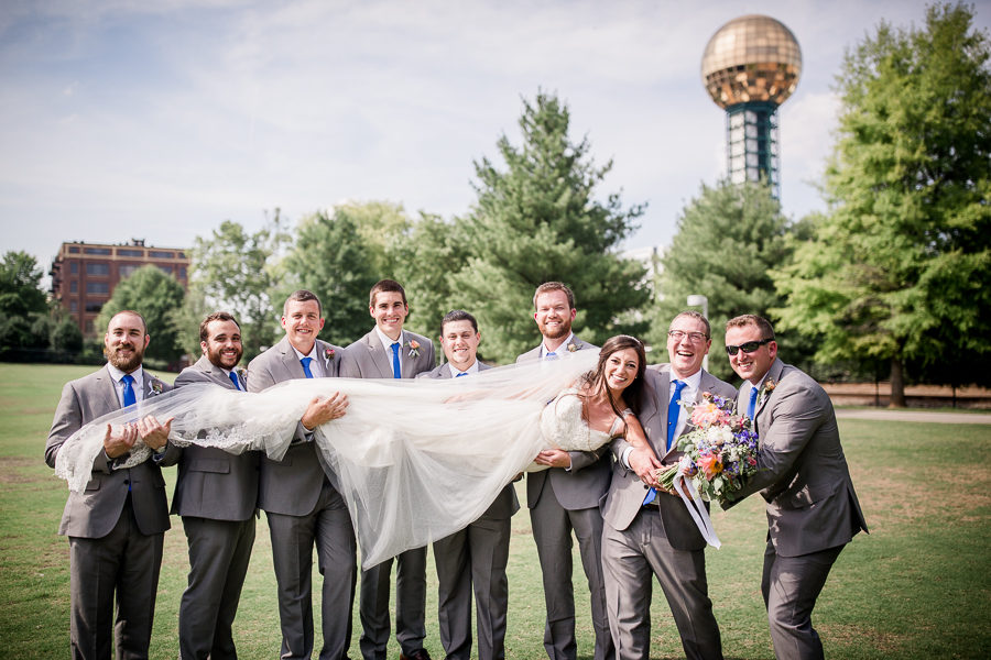 Carrying the bride at these 2017 favorite weddings by Knoxville Wedding Photographer, Amanda May Photos.