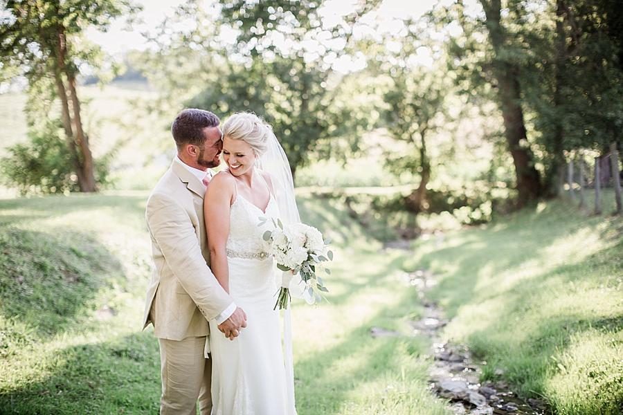 Holding hands with her from behind at these 2017 favorite weddings by Knoxville Wedding Photographer, Amanda May Photos.