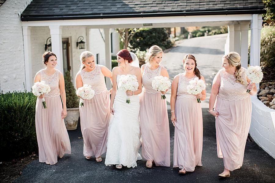 Girls walking in blush gowns at these 2017 favorite weddings by Knoxville Wedding Photographer, Amanda May Photos.