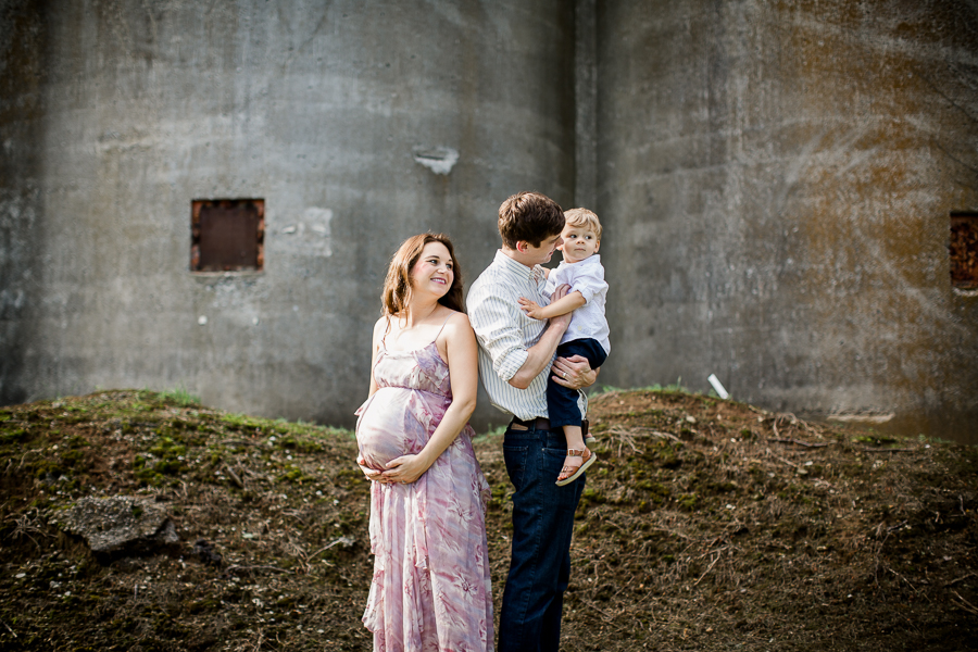 Standing back to back at this downtown Franklin TN family session by Nashville Wedding Photographer, Amanda May Photos.