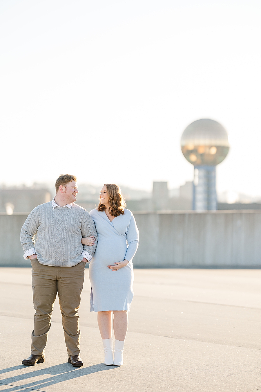 couple in front of sunsphere