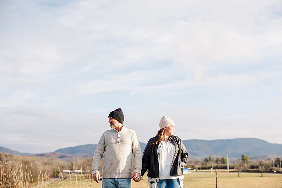 couple in front of smoky mountain view