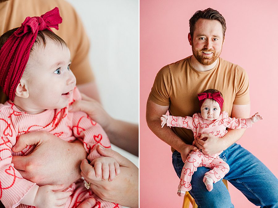 dad holding daughter