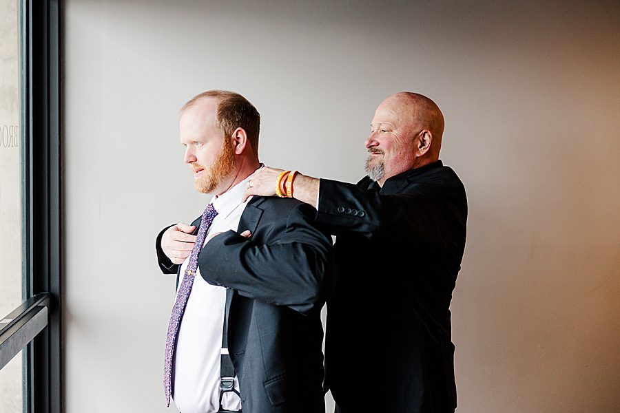 dad helping son get ready