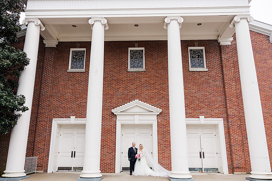 bride and groom outside church