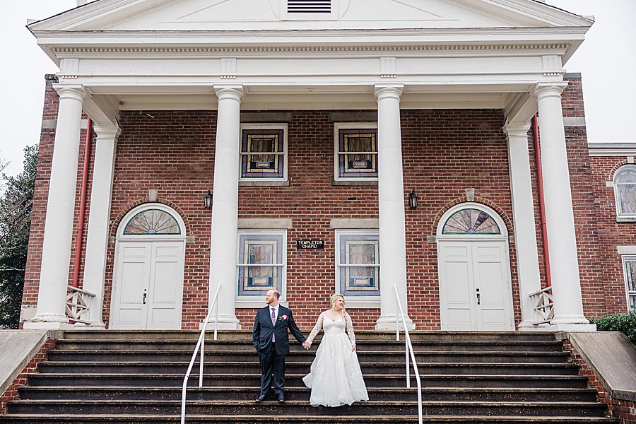 bride and groom standing on church steps