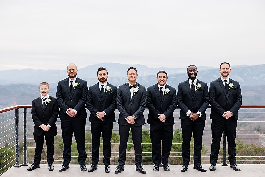 men in black suits at winter trillium wedding