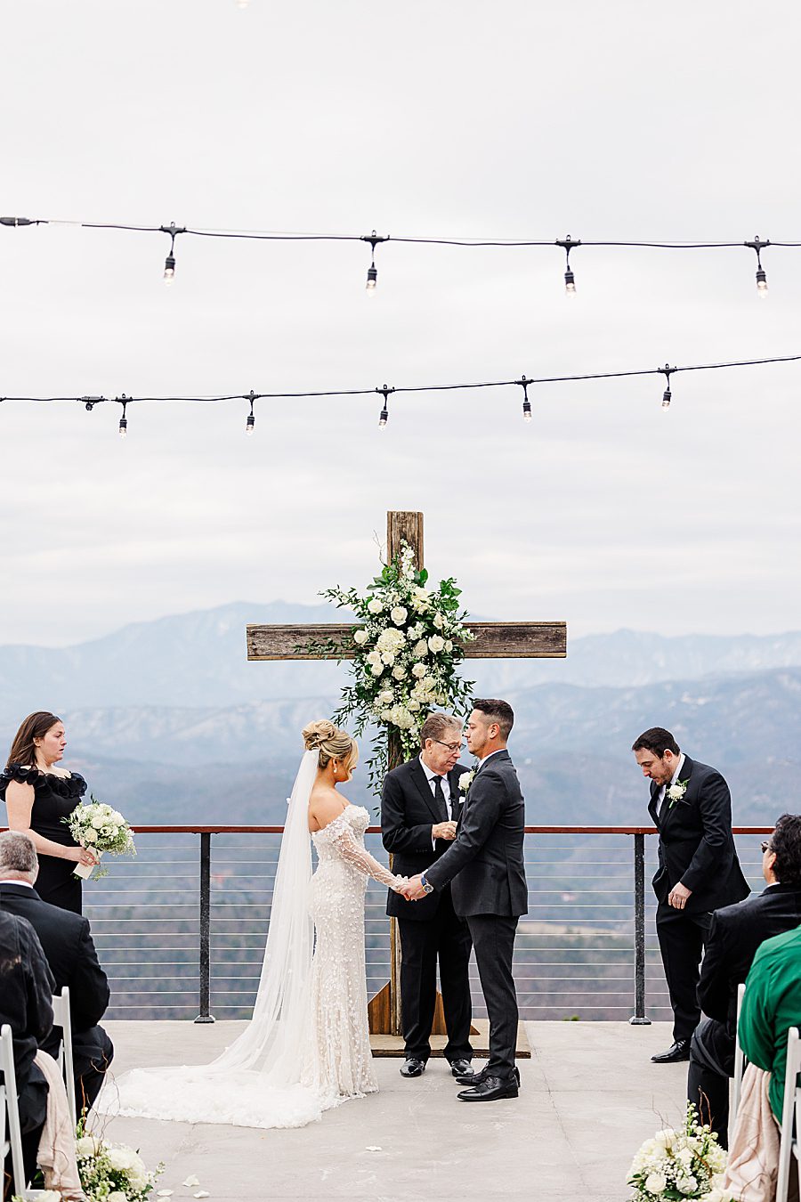 exchanging vows at winter trillium wedding