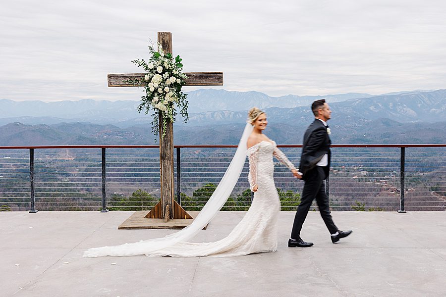 couple walking while holding hands