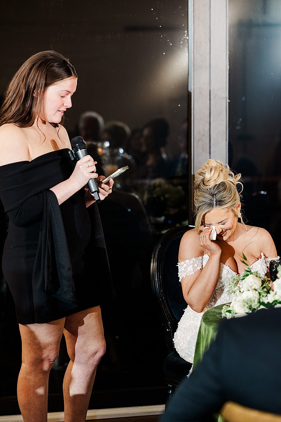 bride crying during toast