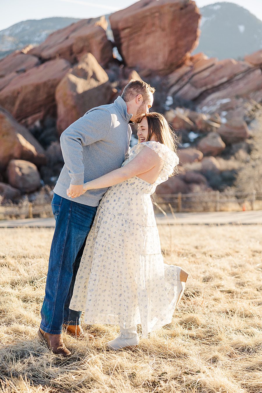 kiss on forehead at red rocks engagement